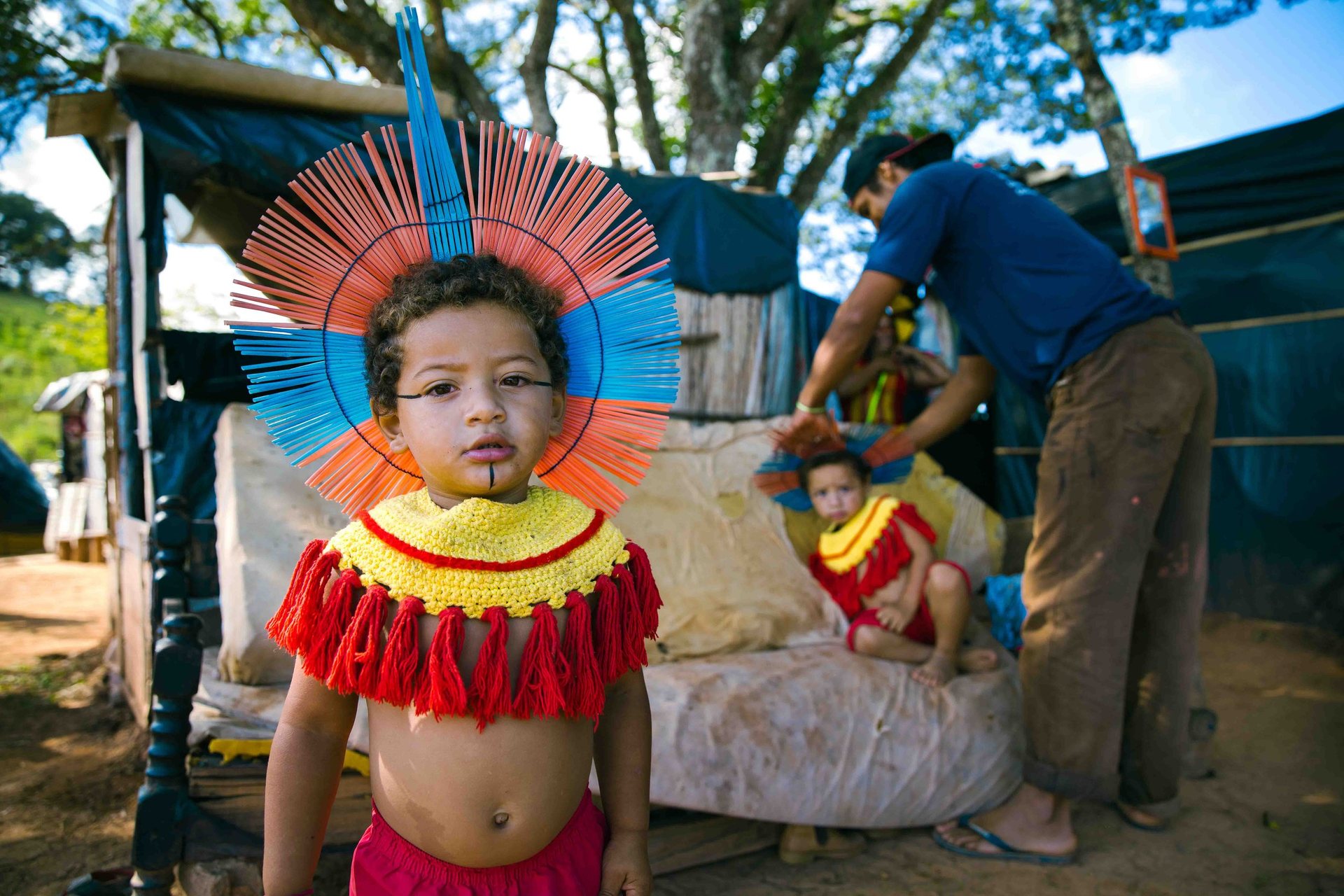 Raynan and Raylan, twins in the Aldeia Arapoã Kakyá, a bucolic riverside community set on acres of verdant land in the state of Minas Gerais.